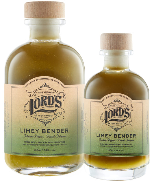 Two bottles of Limey Bender hot sauce 250ml and 100ml with a label that includes the product name and a description as 'Deliciously mild hot sauce made with fresh jalapenos, lime, and cilantro'. The bottles are transparent, showing the greenish colour of the sauce inside.